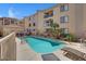 Community pool area with multiple chairs and building in the background at 16631 E El Lago Blvd # 214, Fountain Hills, AZ 85268