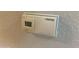 Close up of a digital thermostat on a white wall at 16631 E El Lago Blvd # 214, Fountain Hills, AZ 85268