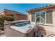 Private hot tub for ultimate relaxation, nestled in a well-maintained backyard setting at 16713 W Monte Vista Rd, Goodyear, AZ 85395