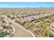 A beautiful aerial view of a suburban neighborhood with well-maintained houses and streets at 1728 W Eagle Talon Trl, Phoenix, AZ 85085