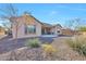 Backyard with a patio, landscaping, and rock groundcover at 1728 W Eagle Talon Trl, Phoenix, AZ 85085