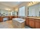 Luxurious bathroom with a soaking tub, double vanity, and ample counter space at 1728 W Eagle Talon Trl, Phoenix, AZ 85085