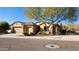 Charming single-story home with a three-car garage and mature landscaping at 1728 W Eagle Talon Trl, Phoenix, AZ 85085