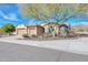 Beautiful single-story home with a three-car garage and mature desert landscaping at 1728 W Eagle Talon Trl, Phoenix, AZ 85085