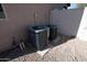 Two HVAC units on a gravel pad at the side of the house at 17441 W Rock Ledge Rd, Goodyear, AZ 85338