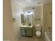 Well lit bathroom showing vanity, toilet, and bathtub/shower combination at 18841 N Palomar Dr, Sun City West, AZ 85375