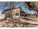 Backyard featuring a neutral colored home exterior, patio, block wall fence, and desert landscaping at 1903 E San Tan St, Chandler, AZ 85225