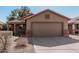 Inviting single-story home featuring a well-kept front yard and an attached two-car garage at 1903 E San Tan St, Chandler, AZ 85225