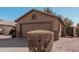 Single-story home with a two-car garage and desert landscaping at 1903 E San Tan St, Chandler, AZ 85225