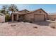 Charming single-story home with a covered porch, a two-car garage, and xeriscaping at 1903 E San Tan St, Chandler, AZ 85225