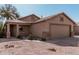 Single-story home with a covered porch, a two-car garage, and xeriscaping at 1903 E San Tan St, Chandler, AZ 85225