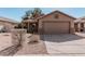 Charming single-story home with a well-maintained front yard and a two-car garage at 1903 E San Tan St, Chandler, AZ 85225