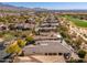 Expansive tile roofs define a neighborhood with picturesque golf course in the background at 19460 N 84Th St, Scottsdale, AZ 85255