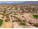 Overhead shot of beautiful desert homes set along a golf course in Scottsdale, blending community with recreation at 19460 N 84Th St, Scottsdale, AZ 85255