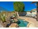 Pool area with lounge chairs and a built-in BBQ, perfect for relaxing and entertaining at 19460 N 84Th St, Scottsdale, AZ 85255