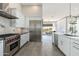 Modern kitchen featuring a view to the backyard and open floorplan at 19460 N 84Th St, Scottsdale, AZ 85255