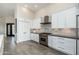 Kitchen features stainless steel appliances, sleek countertops, and ample cabinet space at 19460 N 84Th St, Scottsdale, AZ 85255