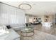 Open-concept living room featuring modern furnishings and abundant natural light in a bright, airy space at 19460 N 84Th St, Scottsdale, AZ 85255