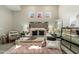 Modern main bedroom featuring a decorative rug, accent pillows and bench at 19460 N 84Th St, Scottsdale, AZ 85255