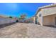 Large backyard with a brick paver patio, block wall fence and space for customization at 21511 N 79Th Dr, Peoria, AZ 85382