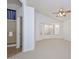 Bright main bedroom featuring a vaulted ceiling, an en-suite bathroom, and lots of light at 21511 N 79Th Dr, Peoria, AZ 85382