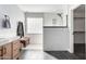 Bathroom showcasing subway tile walls, glass block window, and modern vanity at 21732 N 86Th Ln, Peoria, AZ 85382