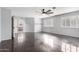 Bedroom with tile floors, and a door leading to a bathroom at 21732 N 86Th Ln, Peoria, AZ 85382