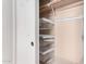 Closet with shelving and racks for optimal bedroom storage organization at 21732 N 86Th Ln, Peoria, AZ 85382