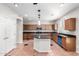 Well-equipped kitchen showcasing a center island with a sink at 21732 N 86Th Ln, Peoria, AZ 85382