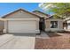 Charming single-story home with well-maintained landscaping and a two-car garage at 21824 N 32Nd Ave, Phoenix, AZ 85027