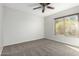 Bedroom featuring a window and neutral carpeting at 2201 S Evergreen Rd, Tempe, AZ 85282