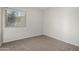 Bedroom featuring a window and neutral carpeting at 2201 S Evergreen Rd, Tempe, AZ 85282