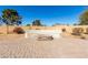 An inviting backyard firepit area, complete with seating, perfect for cozy evenings and outdoor gatherings at 2201 S Evergreen Rd, Tempe, AZ 85282