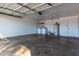 Spacious garage with laundry, water heater, and garage door at 2201 S Evergreen Rd, Tempe, AZ 85282