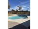 Refreshing backyard swimming pool with a brick and concrete surround, great for enjoying sunny days at 2201 S Evergreen Rd, Tempe, AZ 85282