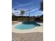 Backyard pool area featuring a well-maintained pool with a brick and concrete surround for lounging at 2201 S Evergreen Rd, Tempe, AZ 85282