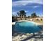 Backyard with a private pool and concrete surround offering a relaxing outdoor space at 2201 S Evergreen Rd, Tempe, AZ 85282