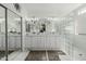 Bright bathroom featuring dual vanities, elegant fixtures, and decorative accents at 24416 S Lakestar Dr, Sun Lakes, AZ 85248