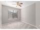 Neutral bedroom with a ceiling fan and a window featuring horizontal blinds at 2640 S Los Altos Dr, Chandler, AZ 85286