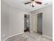 Bright bedroom featuring a closet with sliding doors and a view into the hallway at 2640 S Los Altos Dr, Chandler, AZ 85286