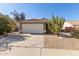 Charming single-story home showcasing desert landscaping, including a vibrant cactus and concrete driveway at 2640 S Los Altos Dr, Chandler, AZ 85286