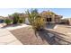 Inviting home featuring a desert landscaped front yard with a mature cactus and concrete driveway at 2640 S Los Altos Dr, Chandler, AZ 85286