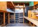 A storage space with wooden shelves, boxes, and various stored items at 2806 W Marshall Ave, Phoenix, AZ 85017