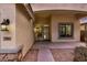 Close up of well maintained porch showing stylish features with desert landscaping and covered entryway at 29983 W Fairmount Ave, Buckeye, AZ 85396