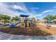 Community playground with play structure with a slide at 29983 W Fairmount Ave, Buckeye, AZ 85396