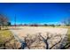 Sand volleyball court with net in the middle at 29983 W Fairmount Ave, Buckeye, AZ 85396