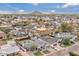 An aerial view showing property's location, spacious backyard with pool, and proximity to the mountain at 3007 N 47Th St, Phoenix, AZ 85018