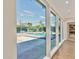 A view of the backyard featuring a pool and gazebo, seen through large windows at 3007 N 47Th St, Phoenix, AZ 85018