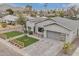 Beautiful modern home featuring a spacious driveway, manicured lawn, and mountain views at 3007 N 47Th St, Phoenix, AZ 85018