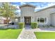 Welcoming front entrance features a modern door, neatly trimmed bushes and paver walkway at 3007 N 47Th St, Phoenix, AZ 85018